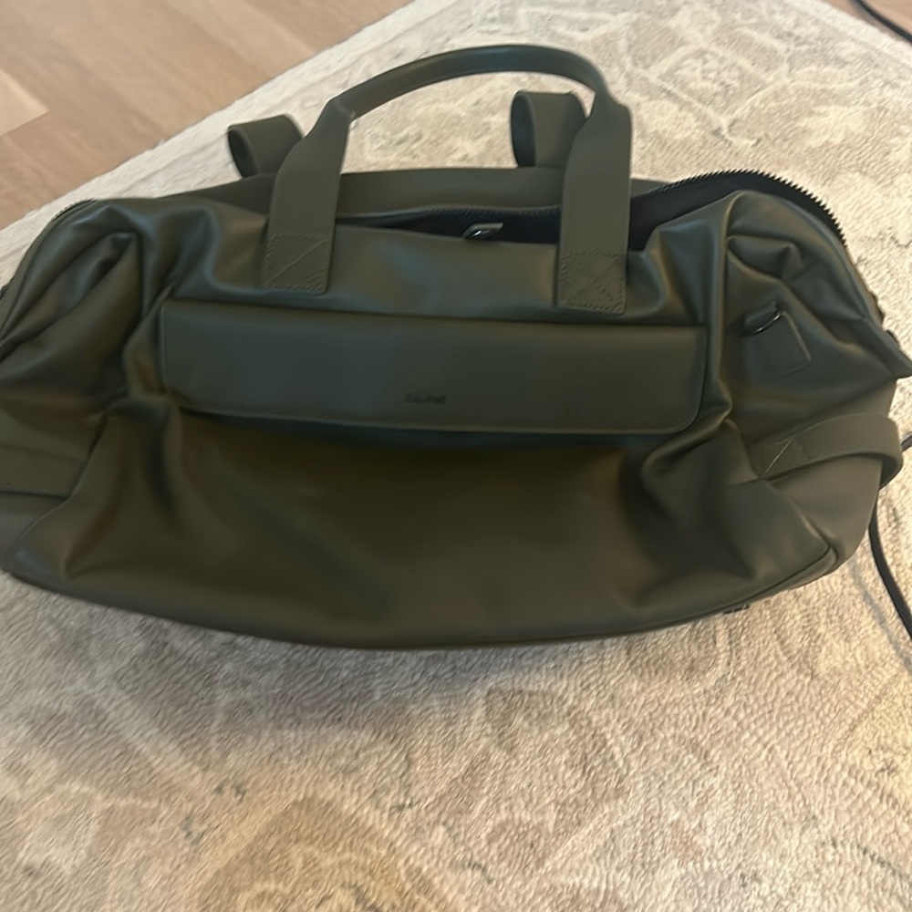Green leather calpak laptop / travel bag